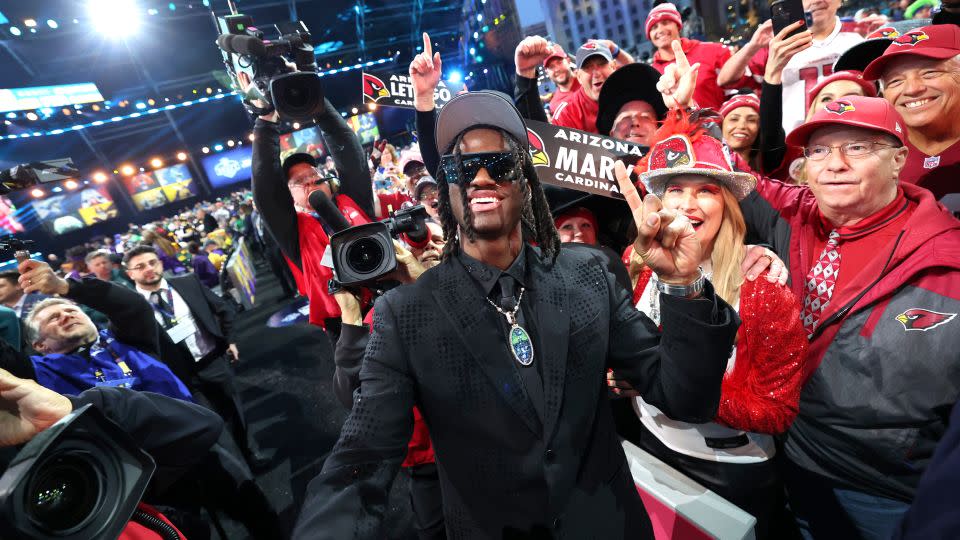 Marvin Harrison Jr. celebrates after being selected by the Arizona Cardinals. - Jeff Lewis/AP