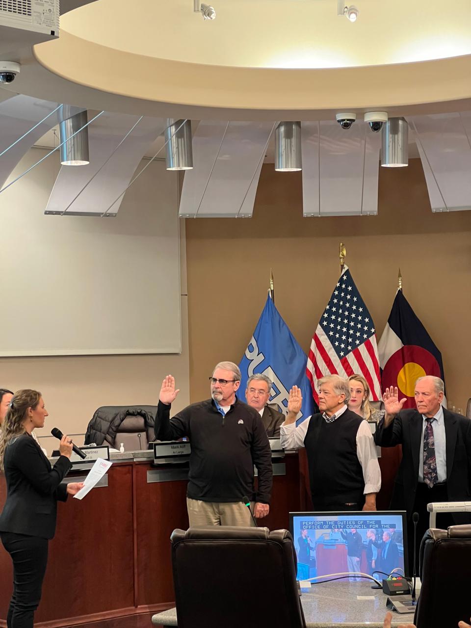 New Pueblo City Council members Mark Aliff, Roger Gomez and Joe Latino are sworn in by City Clerk Marisa Stoller on January 8, 2024.