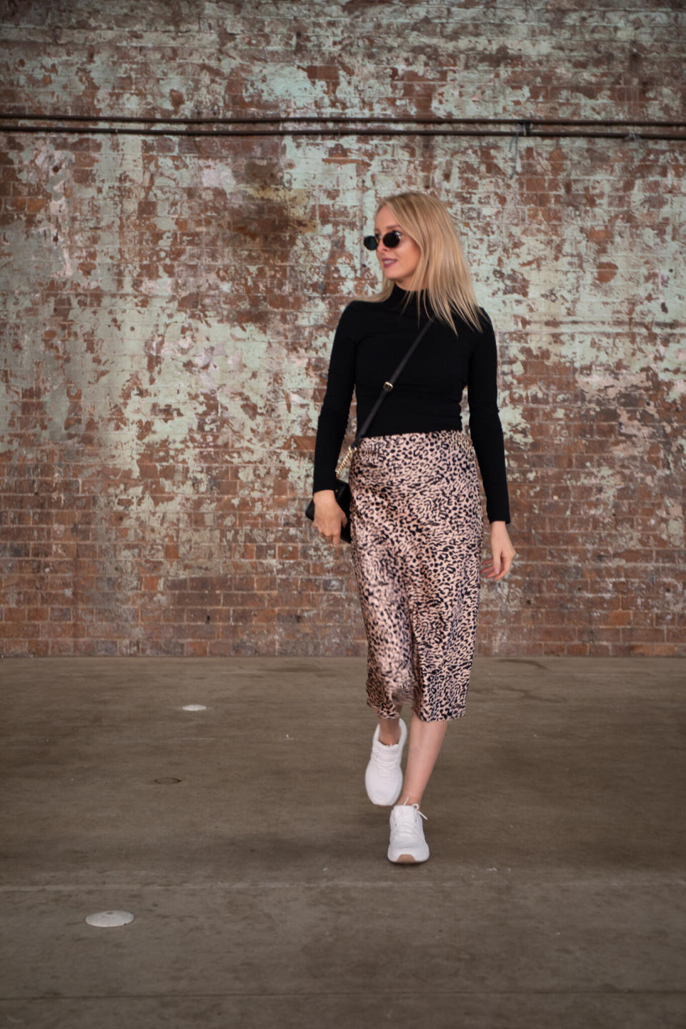 Leopard print skirt and black top from Kmart Australia 