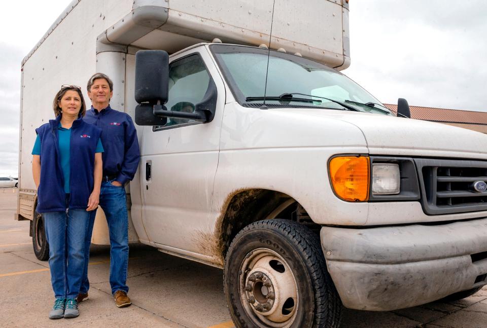 Michel and Marty Mayfield, from left, of Bio-One cleaning services pose for a photo in Oklahoma City, Okla. on Friday, March 18, 2022. 