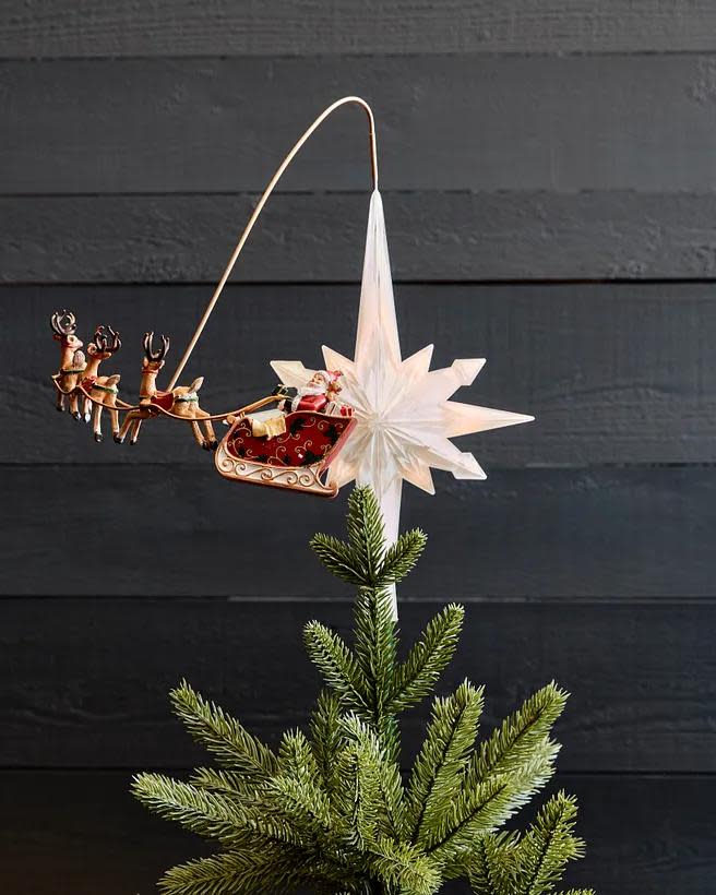 <p><a href="https://go.redirectingat.com?id=74968X1596630&url=https%3A%2F%2Fwww.balsamhill.com%2Fp%2Fsantas-sleigh-animated-christmas-tree-topper%3Fsku%3D4003828&sref=https%3A%2F%2Fwww.housebeautiful.com%2Fentertaining%2Fholidays-celebrations%2Fg45735039%2Fchristmas-tree-topper-ideas%2F" rel="nofollow noopener" target="_blank" data-ylk="slk:Shop Now;elm:context_link;itc:0;sec:content-canvas" class="link rapid-noclick-resp">Shop Now</a></p><p>Santa's Sleigh Animated Tree Topper</p><p>balsamhill.com</p><p>$99.00</p>