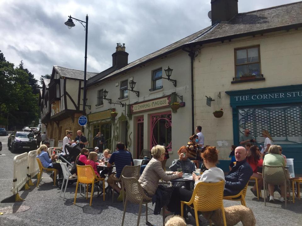 people dining outside a restaurant in ireland