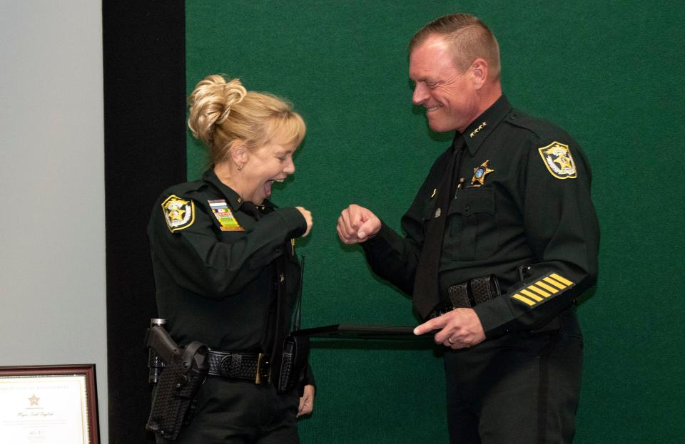 Officer Christie Mysinger is promoted to Captain by Sheriff Peyton Grinnell at the Lake County Sheriff’s Office promotion ceremony in March.