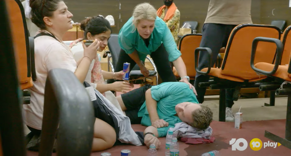 Grant Denyer lying on the floor in The Amazing Race Australia: Celebrity Edition trailer.