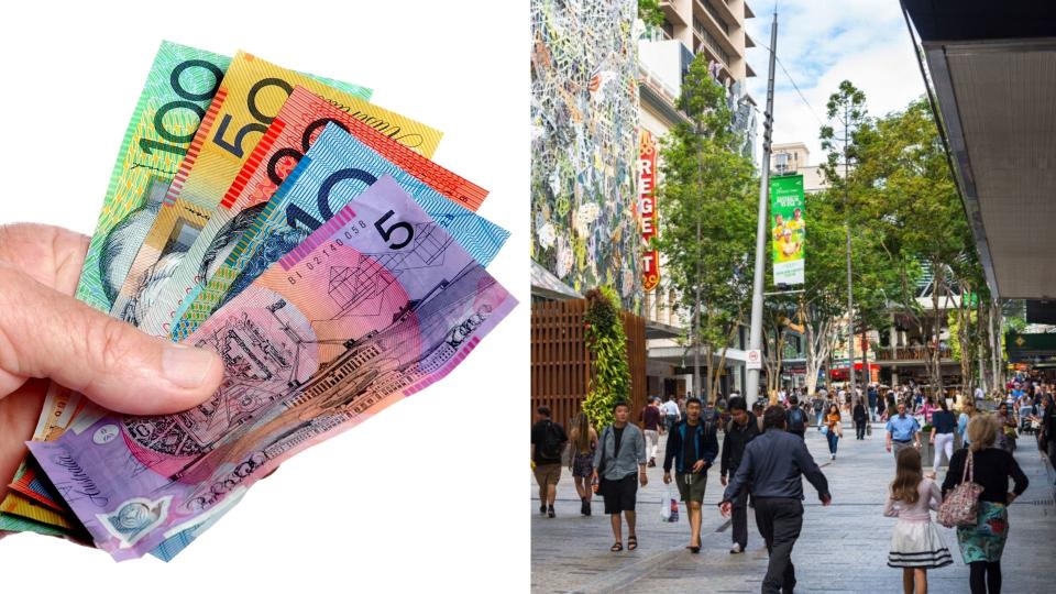 Pictured: Hand holding Australian cash, busy Australian shopping strip suggesting coronavirus cash splash. Image: Getty