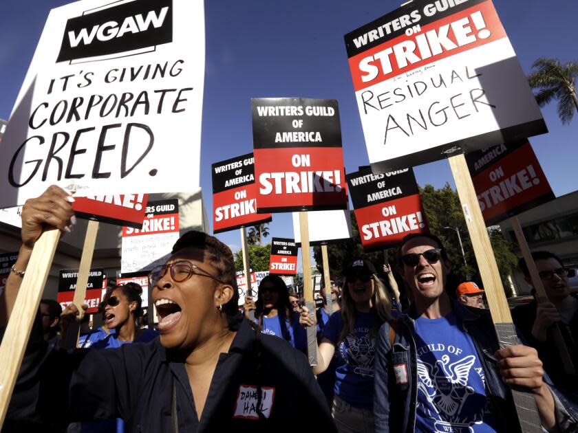 Writers Guild members protest during a strike.