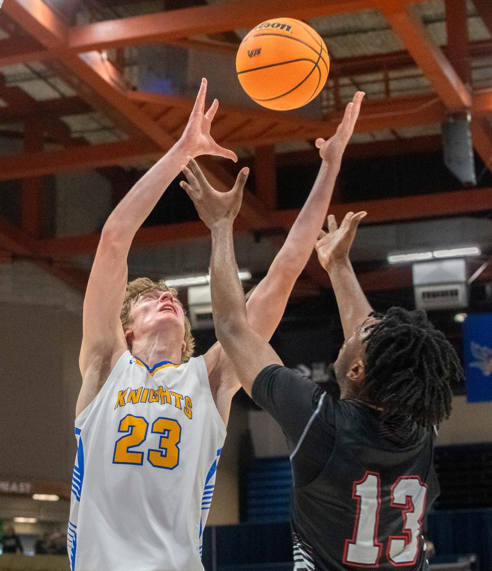 Ripon Christian's Jace Beidleman, left, fights for a rebound with Future's EJ George during the Sac-Joaquin Section Div. 5 boys basketball championship game at U.C. Davis' University Credit Union Center in Davis on Feb. 23, 2024.