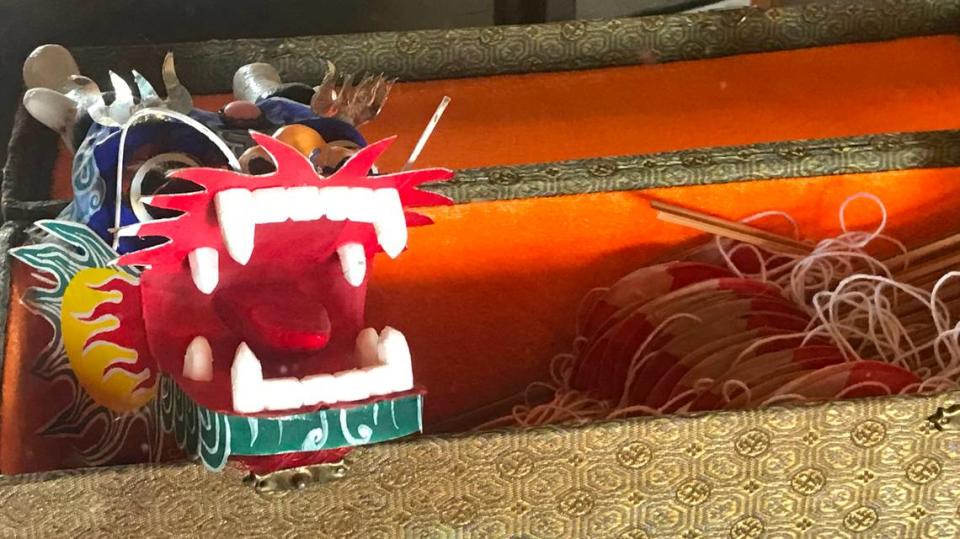 This comically fearsome little dragon is one of the Chinese artifacts displayed in a glass case at the historic Mee Heng Low restaurant in San Luis Obispo. Kathe Tanner/ktanner@thetribunenews.com