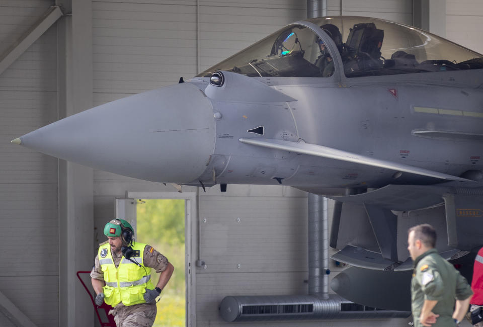 Spain's Eurofighter Typhoon jet fighter pilot prepares for take off during NATO's Baltic Air Policing Mission during the Lithuania's President Gitanas Nauseda and Spain's Prime Minister Pedro Sanchez visit at the Siauliai military air force base some 220 kms (136,7 miles) east of the capital Vilnius, Lithuania, Thursday, July 8, 2021. (AP Photo/Mindaugas Kulbis)