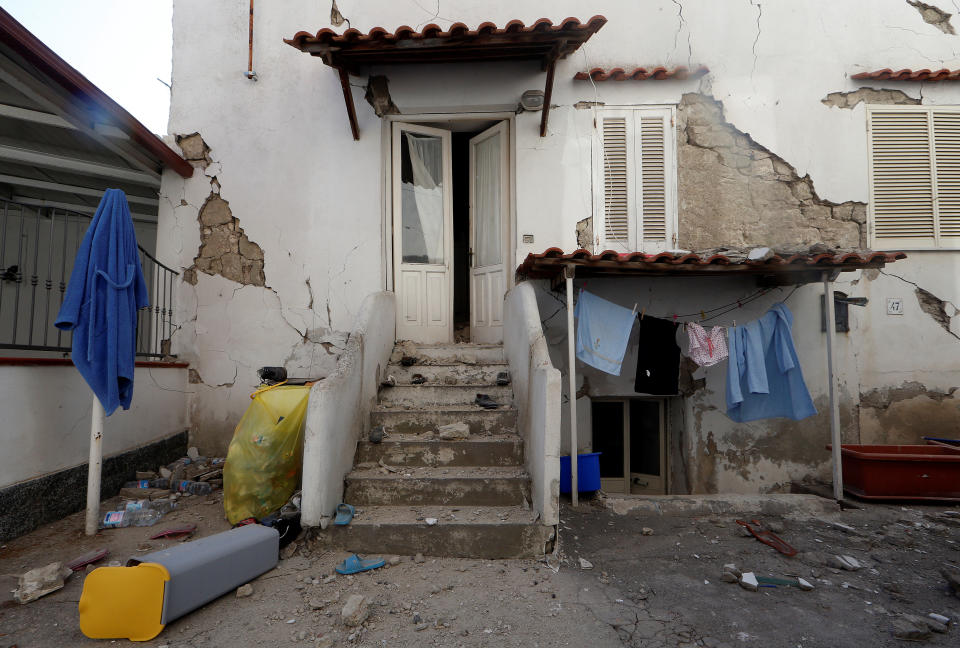 <p>A damaged house is seen after an earthquake hits the island of Ischia, off the coast of Naples, Italy, Aug. 22, 2017. (Photo: Ciro De Luca/Reuters) </p>