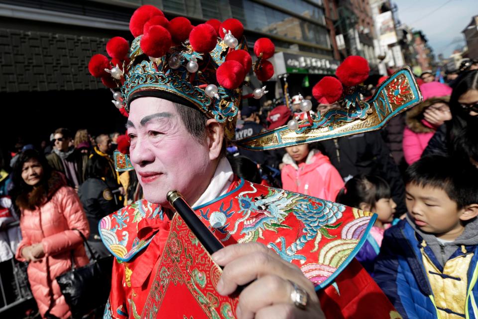 A parade participant wears a traditional Chinese costume at the annual Chinese Lunar New Year Parade in Chinatown in New York in 2015.