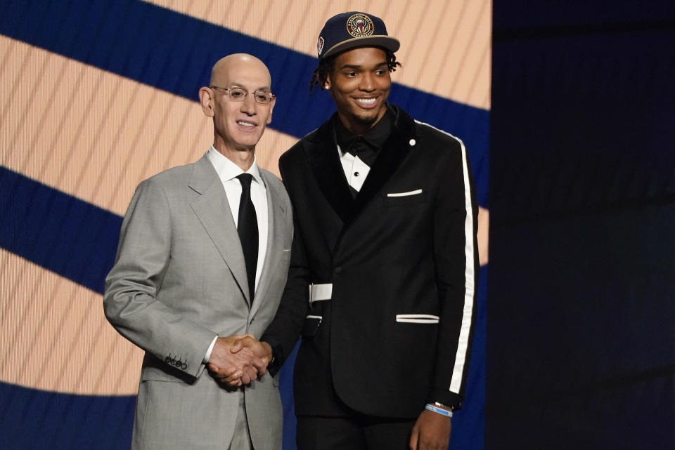 Ziaire Williams, right, poses for a photo with NBA Commissioner Adam Silver after being selected tenth overall by the New Orleans Pelicans during the NBA basketball draft, Thursday, July 29, 2021, in New York. - Credit: AP