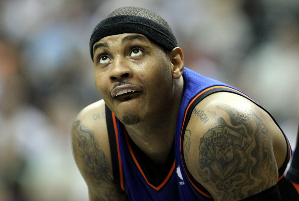 Carmelo Anthony watches a free throw during the NBA game against the Indiana Pacers at Bankers Life Fieldhouse on April 3, 2012. (Photo by Andy Lyons/Getty Images)