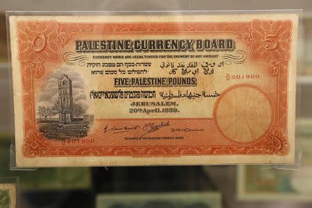 A sample of a Palestine's banknote is displayed at the currency museum of Lebanon's Central Bank in Beirut November 6, 2014. REUTERS/Jamal Saidi