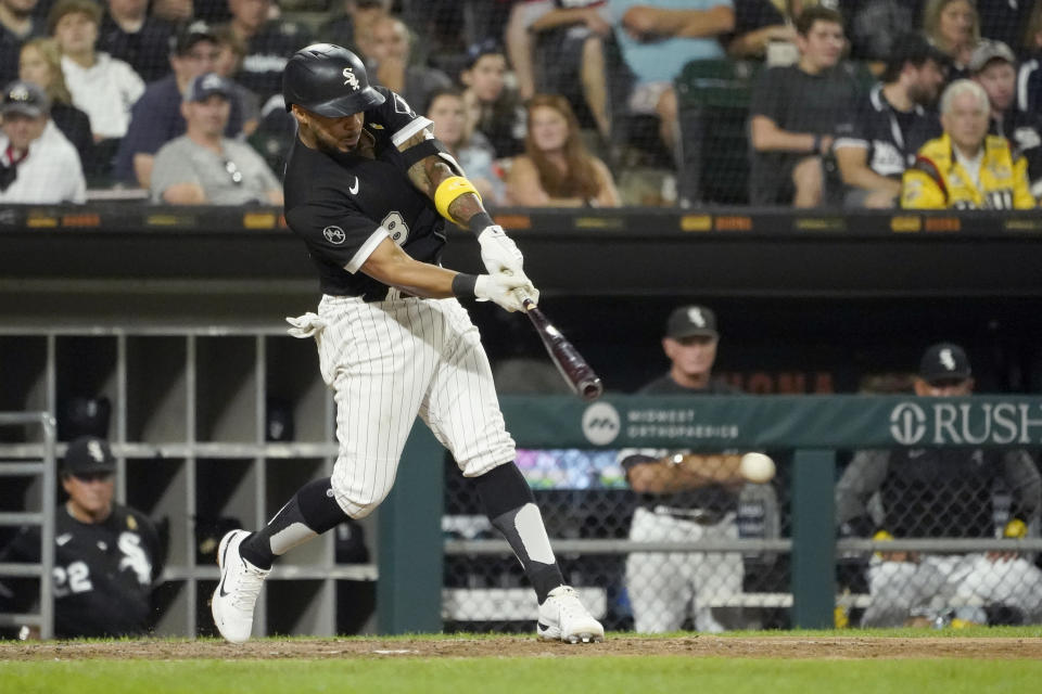 Chicago White Sox's Leury Garcia hits an RBI double off Pittsburgh Pirates relief pitcher Anthony Banda during the fifth inning of a baseball game Wednesday, Sept. 1, 2021, in Chicago. (AP Photo/Charles Rex Arbogast)