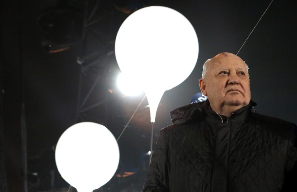 <div class="inline-image__title">458697698</div> <div class="inline-image__caption"><p>Former Soviet leader Mikhail Gorbachev attends celebrations for the 25th anniversary of the fall of the Berlin Wall at the Brandenburg Gate on Nov. 9, 2014 in Berlin. The city of Berlin commemorated the anniversary with an installation of 6,800 lamps coupled with illuminated balloons along a 15km route where the Wall once ran and divided the city into capitalist West and communist East.</p></div> <div class="inline-image__credit">Adam Berry/Getty Images</div>