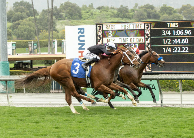 In a photo provided by Benoit Photo, The Chosen Vron and jockey Hector I. Berrios, (3) storm up on the leaders and go on to win the $100,000 Sensational Star Stakes horse race Sunday, March 19, 2023, at Santa Anita in Arcadia, Calif. (Benoit Photo via AP)