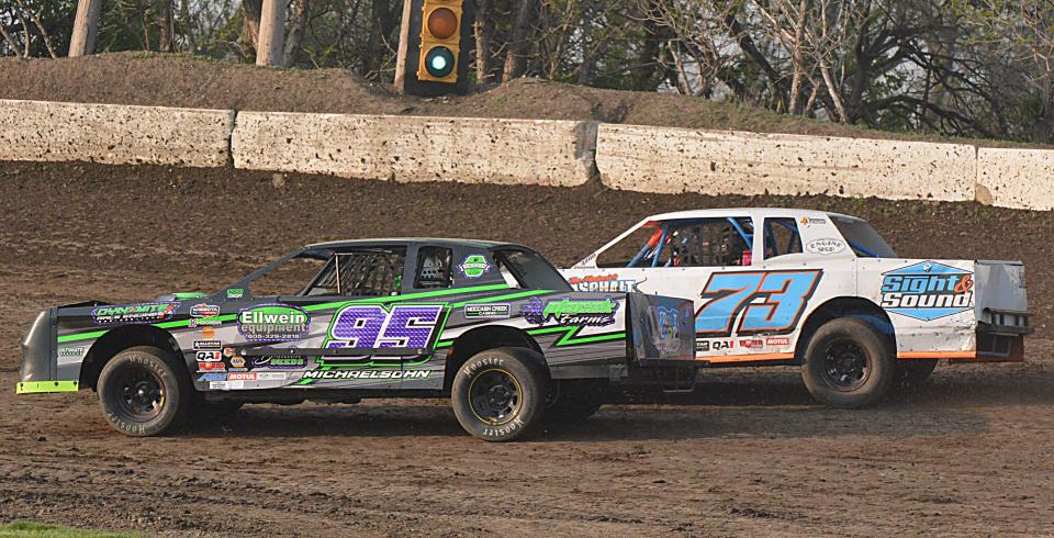 Jayden Michaelson of Aberdeen (95) leads Cory Giessinger of Watertown (73) in a street stock heat during the season-opening racing program on Sunday, May 12, 2024 at Casino Speedway in Watertown.