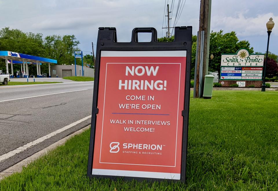 Spherion, a staffing and recruiting firm, had a "Now Hiring!" sign set up on East Oak Ridge Drive Friday. The firm has an office at 120 E. Oak Ridge Drive, Suite 700.