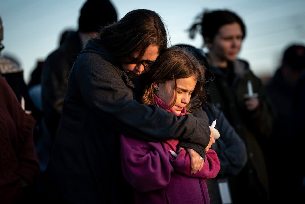 Mourners hug at a vigil following the March school shooting in Nashville which left six dead, not including the shooter killed by police (The Tennessean)