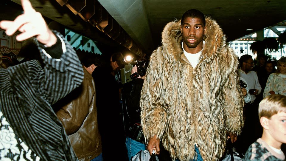 Earvin "Magic" Johnson #32 of the Los Angeles Lakers arrives for the 1988 NBA All-Star Game on February 7, 1988 in Chicago, Illinois. - Andrew D. Bernstein/NBAE/Getty Images/Courtesy Workman