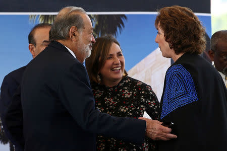 U.S. Ambassador to Mexico Roberta S. Jacobson speaks with Mexican billionaire Carlos Slim as they attend a ceremony to place the first stone of the new U.S. Embassy in Mexico City, Mexico February 13, 2018. REUTERS/Edgard Garrido