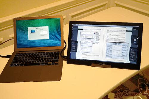 MacBook Air with ASUS MB168B+ monitor plugged into it