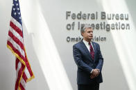 FBI Director Christopher Wray waits to speak at a news conference, Wednesday, Aug. 10, 2022, in Omaha, Neb. (AP Photo/Charlie Neibergall)