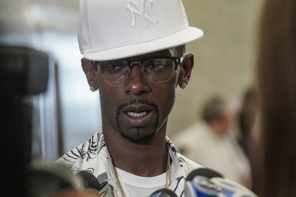 Vincent Ellerbe speaks with press following his exoneration hearing at Brooklyn Supreme Court, Friday July 15, 2022, in New York. After decades in prison Ellerbe, Thomas Malik and James Irons were cleared Friday in one of the most horrifying crimes of New York's violent 1990s — the killing of a clerk who was set on fire in a subway toll booth. (AP Photo/Bebeto Matthews)