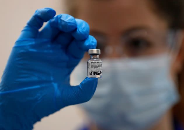 A nurse holds a phial of the Pfizer-BioNTech COVID-19 vaccine at Guy's Hospital in London. U.K. Biontech CEO Ugur Sahin says the German pharmaceutical company is confident that the Pfizer-BioNTech COVID-19 vaccine works against the UK variant of the virus, but further studies are need to be completely sure.