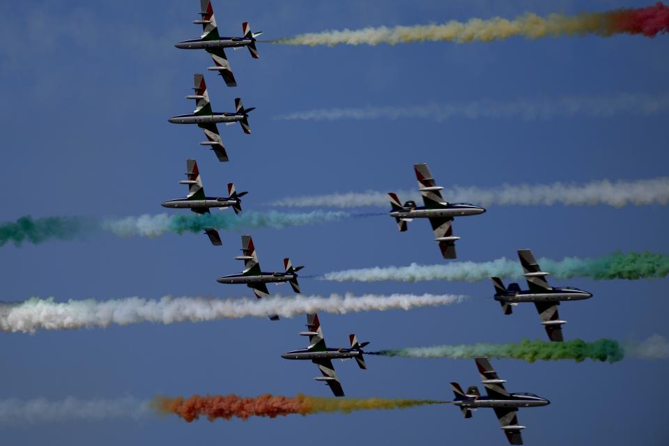 Frecce Tricolori (Tricolor Arrows), the Italian Air Force aerobatic display team, perform during the opening day of the Dubai Air Show, United Arab Emirates, Monday, Nov. 13, 2023. (AP Photo/Kamran Jebreili)