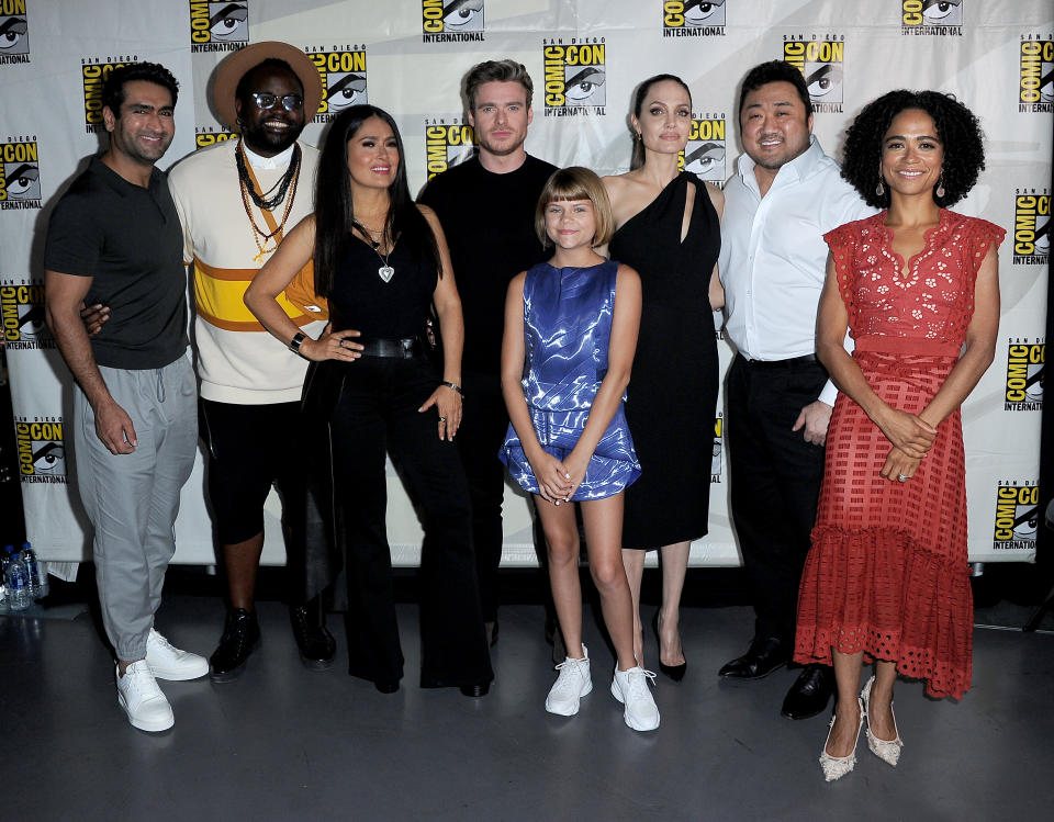 SAN DIEGO, CALIFORNIA - JULY 20:  (L-R) Kumail Nanjiani, Brian Tyree Henry, Salma Hayek, Chloe Zhao, Lia McHugh, Richard Madden, Angelina Jolie, Lauren Ridloff and Dong-seok Ma attend the Marvel Studios Panel during 2019 Comic-Con International at San Diego Convention Center on July 20, 2019 in San Diego, California. (Photo by Albert L. Ortega/Getty Images)