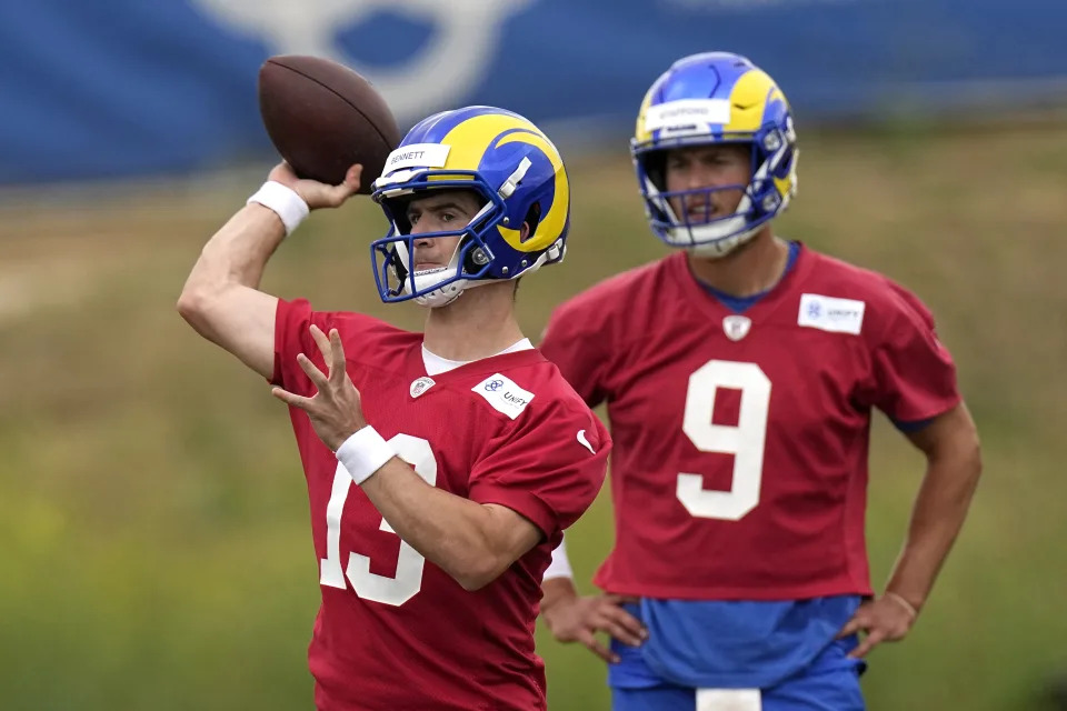 Rookie QB Stetson Bennett (left) is learning as much as he can from Rams starter and fellow Georgia Bulldogs product Matthew Stafford. (AP Photo/Mark J. Terrill)
