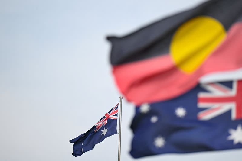 An Australian and an Aboriginal flag are seen in Canberra
