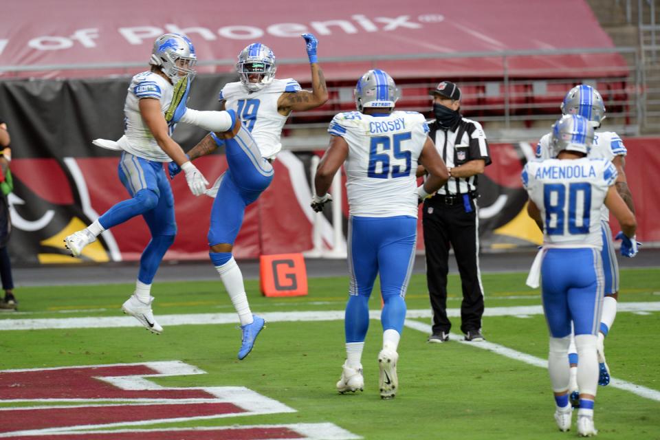 Detroit Lions wide receiver Kenny Golladay (19) celebrates a touchdown catch against the Arizona Cardinals during the first half Sept. 27, 2020, at State Farm Stadium.