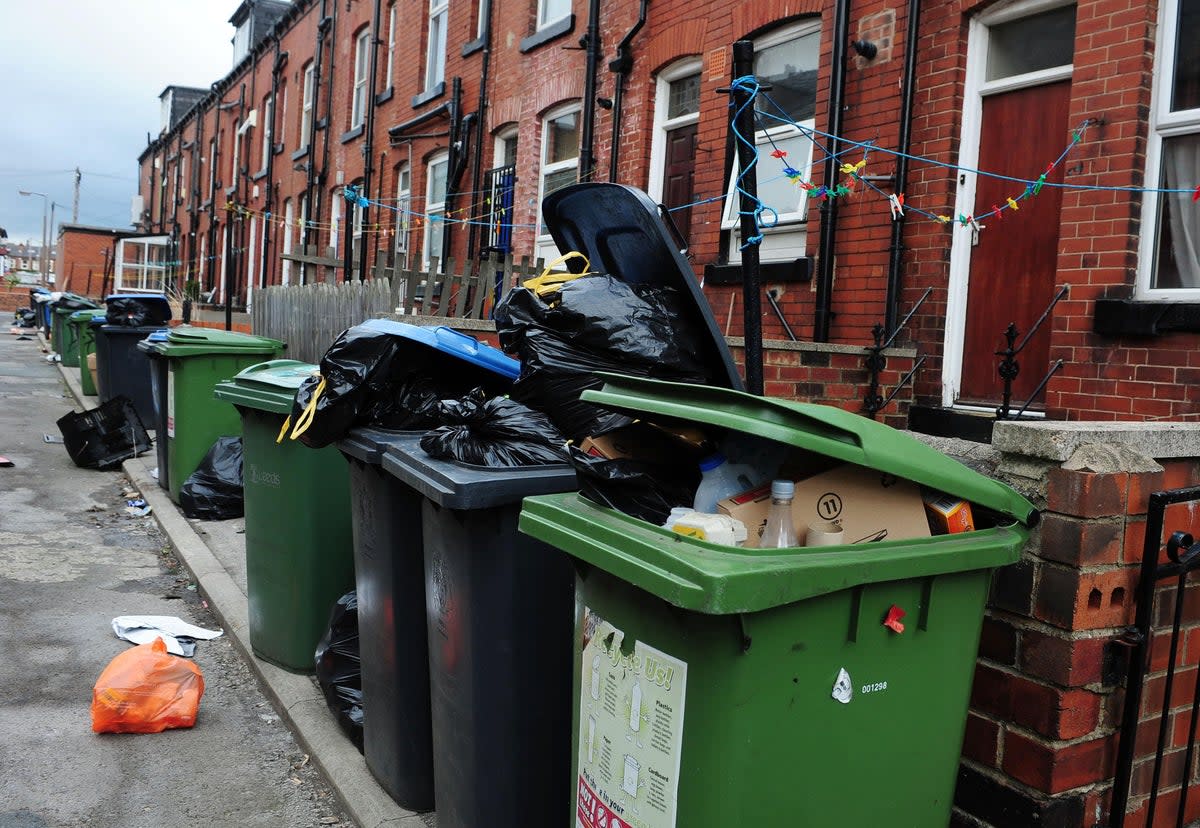 Bags of rubbish and overflowing bins (Anna Gowthorpe/PA) (PA Archive)