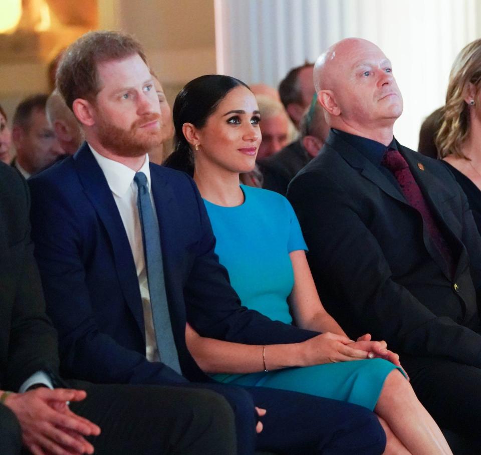 <p>The Duke and Duchess of Sussex held hands as they listened to speeches and witness a <a href="https://www.elle.com/uk/life-and-culture/culture/a31256531/meghan-markle-prince-harry-surprise-proposal-london/" rel="nofollow noopener" target="_blank" data-ylk="slk:marriage proposal" class="link ">marriage proposal</a> at the The Endeavour Fund Awards in London in March. </p><p>For the occasion, the mother-of-one wore a fitted teal dress by <a href="https://www.elle.com/uk/fashion/celebrity-style/longform/a36026/victoria-beckham-cover-interview-may-17-elle-uk/" rel="nofollow noopener" target="_blank" data-ylk="slk:Victoria Beckham" class="link ">Victoria Beckham</a> and BB pumps by Manolo Blahnik. </p>