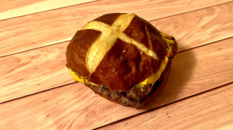 bun with cross in it