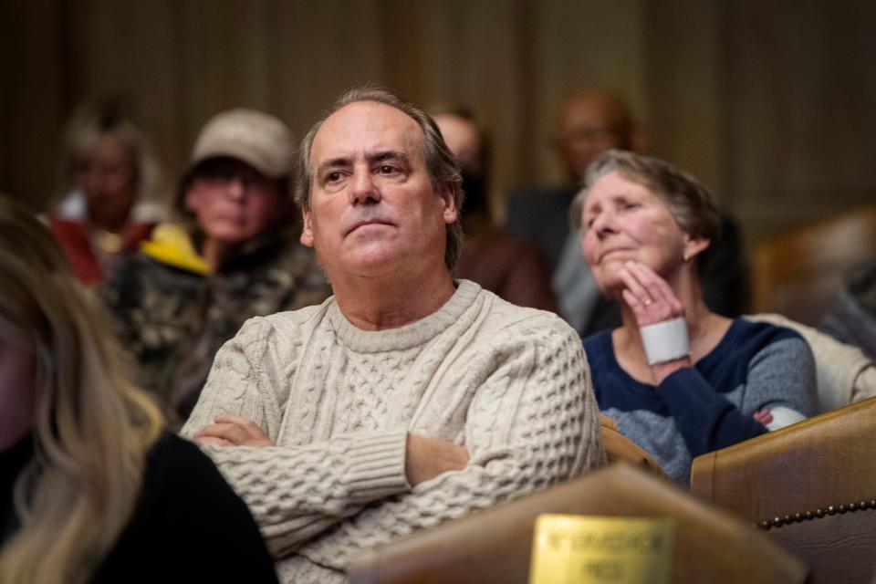 People sit in on an Asheville City Council meeting, January 10, 2023, which addressed the water outages that impacted thousands the previous month.