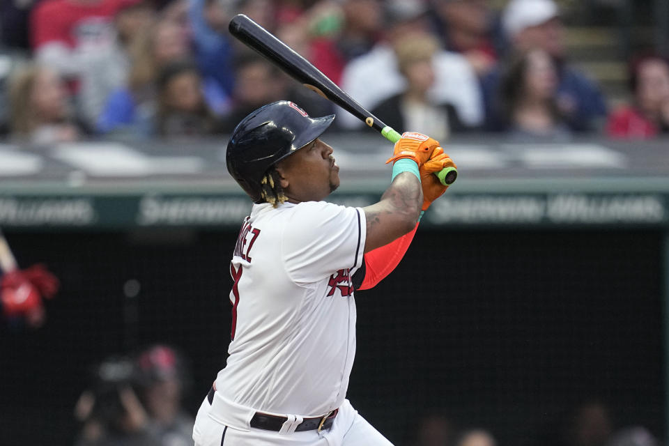 Cleveland Guardians' Jose Ramirez watches his home run against the Boston Red Sox during the third inning of a baseball game Thursday, June 8, 2023, in Cleveland. It was Ramirez's 200th career home run. (AP Photo/Sue Ogrocki)