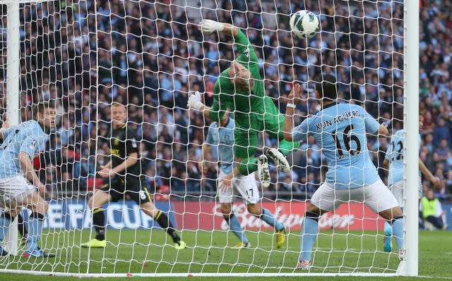 Ben Watson heads in Wigan's late winner