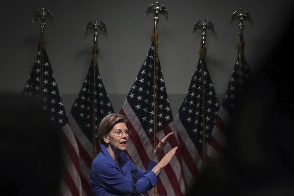 Democratic presidential candidate Sen. Elizabeth Warren, D-Mass., gestures during her address at the New Hampshire Institute of Politics in Manchester, N.H., Thursday, Dec. 12, 2019.(AP Photo/Charles Krupa)