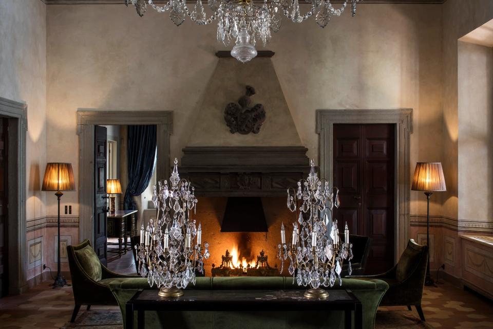 The villa comes with its own chandeliers, because of course it does.<span class="copyright">Photographed by Bruno Erhs</span>