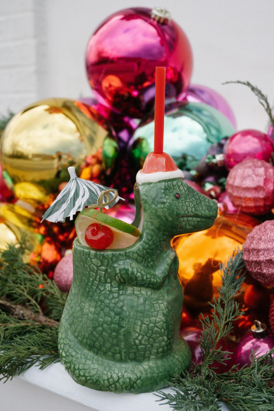 The Miracle holiday cocktail pop-up returns to The Liquor Store for the third year in a row.  The pop-up features holiday-inspired cocktails in kitschy glassware.  Pictured is the Grandma Got Run Over by A T-Rex.
