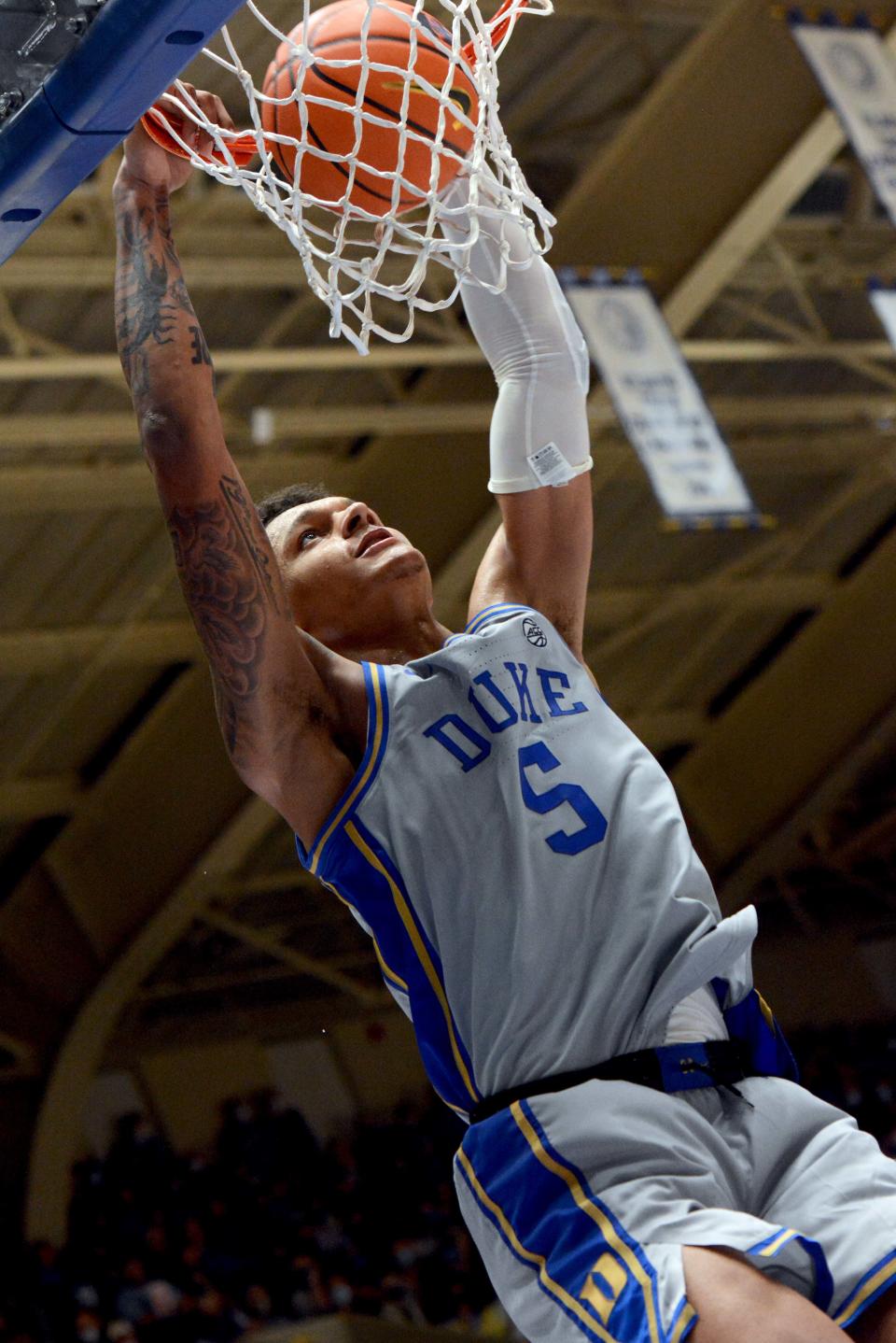 Nov 12, 2021; Durham, North Carolina, USA; Duke Blue Devils forward Paolo Banchero (5) dunks during the second half against the Army Black Knights at Cameron Indoor Stadium. Mandatory Credit: Rob Kinnan-USA TODAY Sports