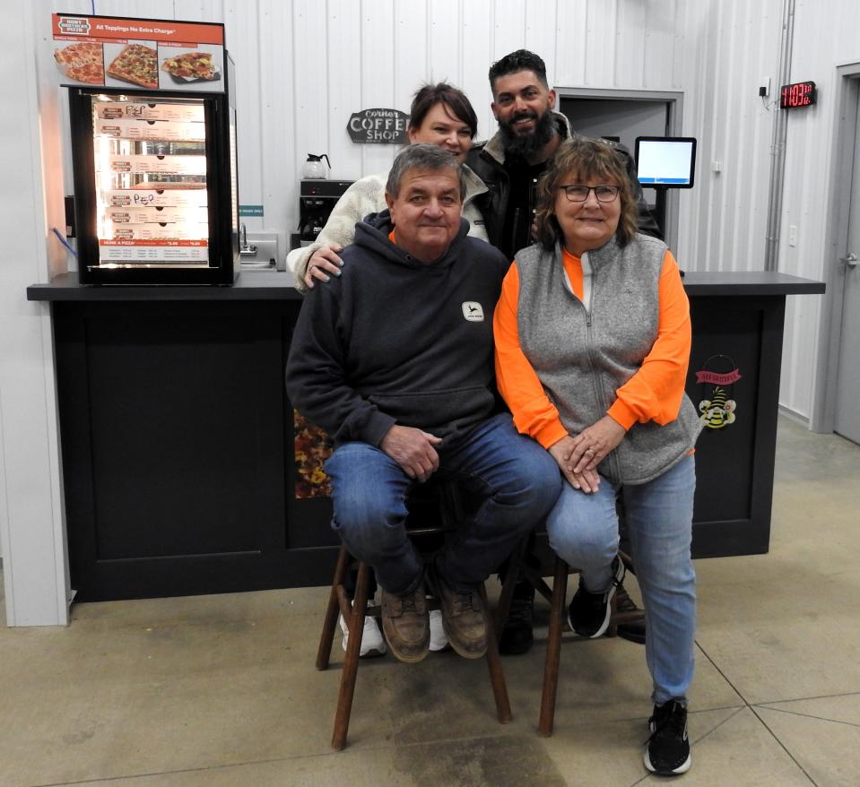 Michelle and Robert Dorsey and Michael and Gloria Mosholder recently opened Mossy's Corner Drive Thru on U.S. 36 in New Castle. The gas station portion should be completed and ready for use in about a month.