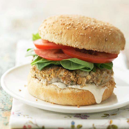 When you're really craving a juicy burger—but you don’t want greasy—try these healthy burgers. Each better-for-you recipe piles on fresh produce to add nutrients. We included veggie burgers, black bean burgers, more meatless burgers, and, of course, classic ground beef burgers. Each one of them is ready in 45 minutes or less for hassle-free weeknight cooking.