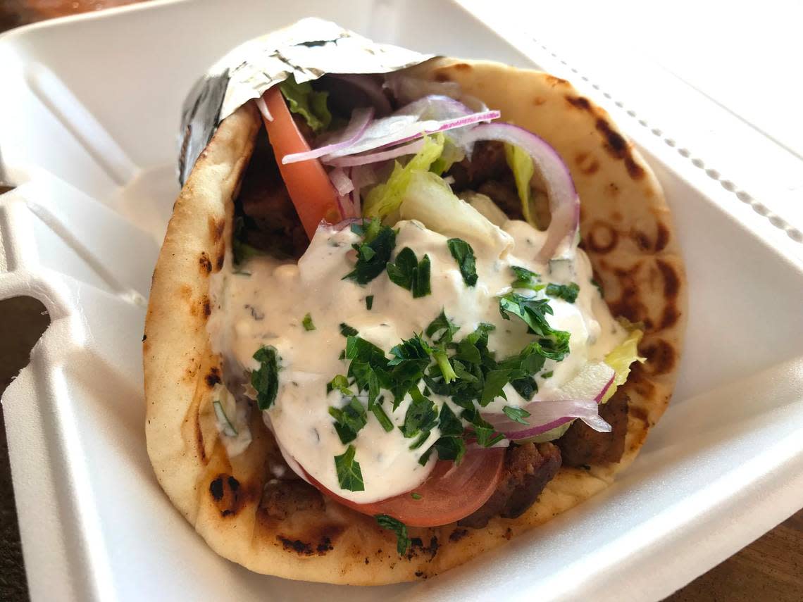 Hummus & Pita’s gyro. Entrees are served with rice and salad.