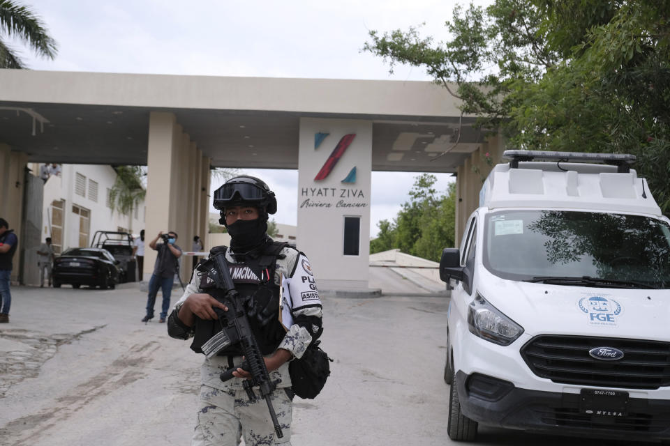 Government forces guard the entrance of hotel after an armed confrontation near Puerto Morelos, Mexico, Thursday, November 4, 2021. Two suspected drug dealers were killed after gunmen from competing gangs staged a dramatic shootout near upscale hotels that sent foreign tourists scrambling for cover. (AP Photo/Karim Torres)