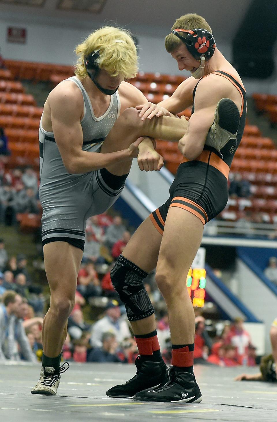 Austin Marry of Hudson takes down Jack Bagwell of Martin/Climax Scott at 144 pounds going on for the win 12-3 in the D4 team semifinals at the Wings Event Center in Kalamazoo Saturday, February 25, 2023.